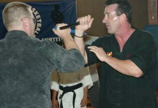 Master Richard Ryan gives Sensei Kevin a lesson